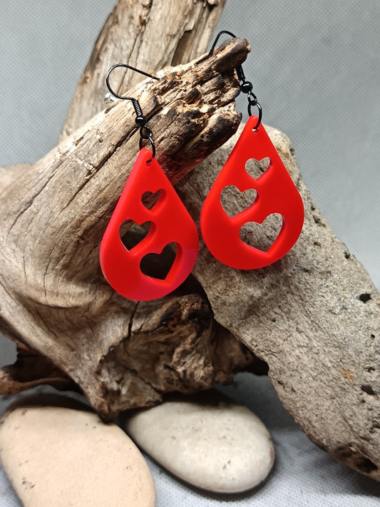 Radiant Teardrop Earrings with Triple Hearts